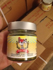 Fleur d'ail en pot dans l'huile